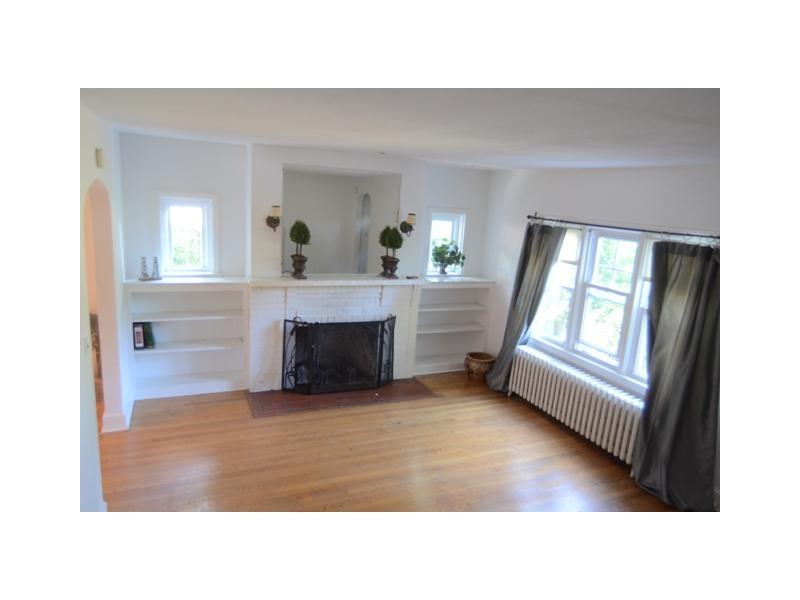 45 Sheep Hill Road Riverside, CT 06878 - Photo 9 of 15 a living room with furniture and a fireplace