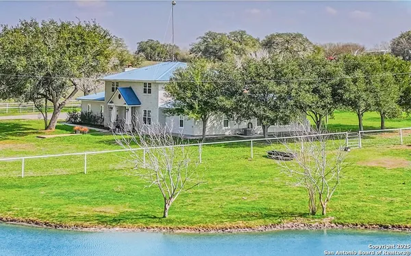 a view of a house with a big yard