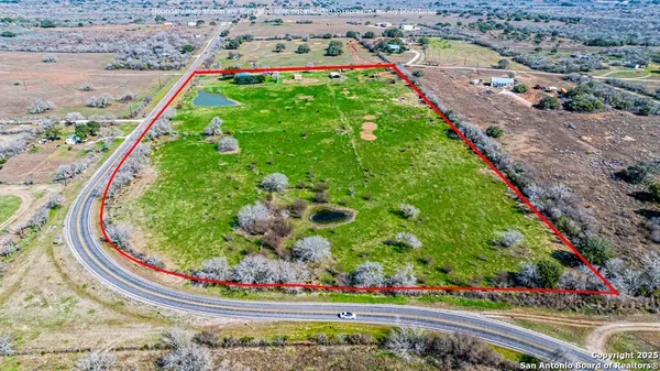 a view of a building with an outdoor space and seating
