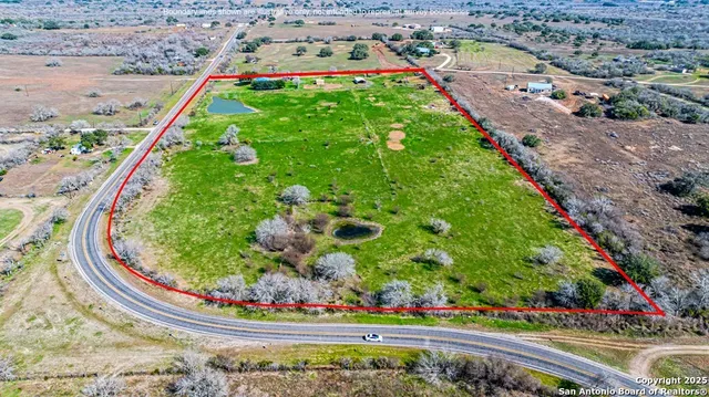 a view of a building with an outdoor space and seating