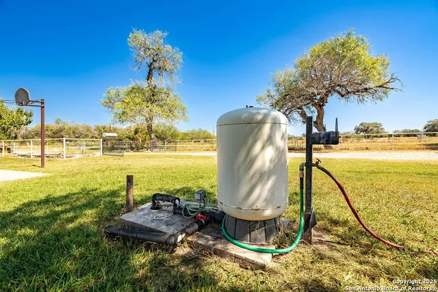 a view of a room with stairs and windows