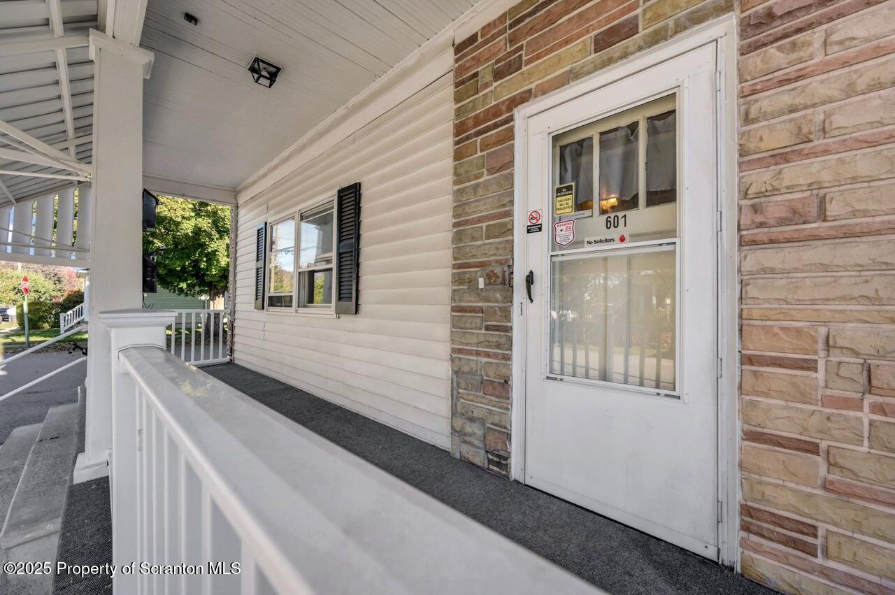 601 Dean Street Scranton, PA 18509 - Photo 2 of 58 a view of a house with a balcony