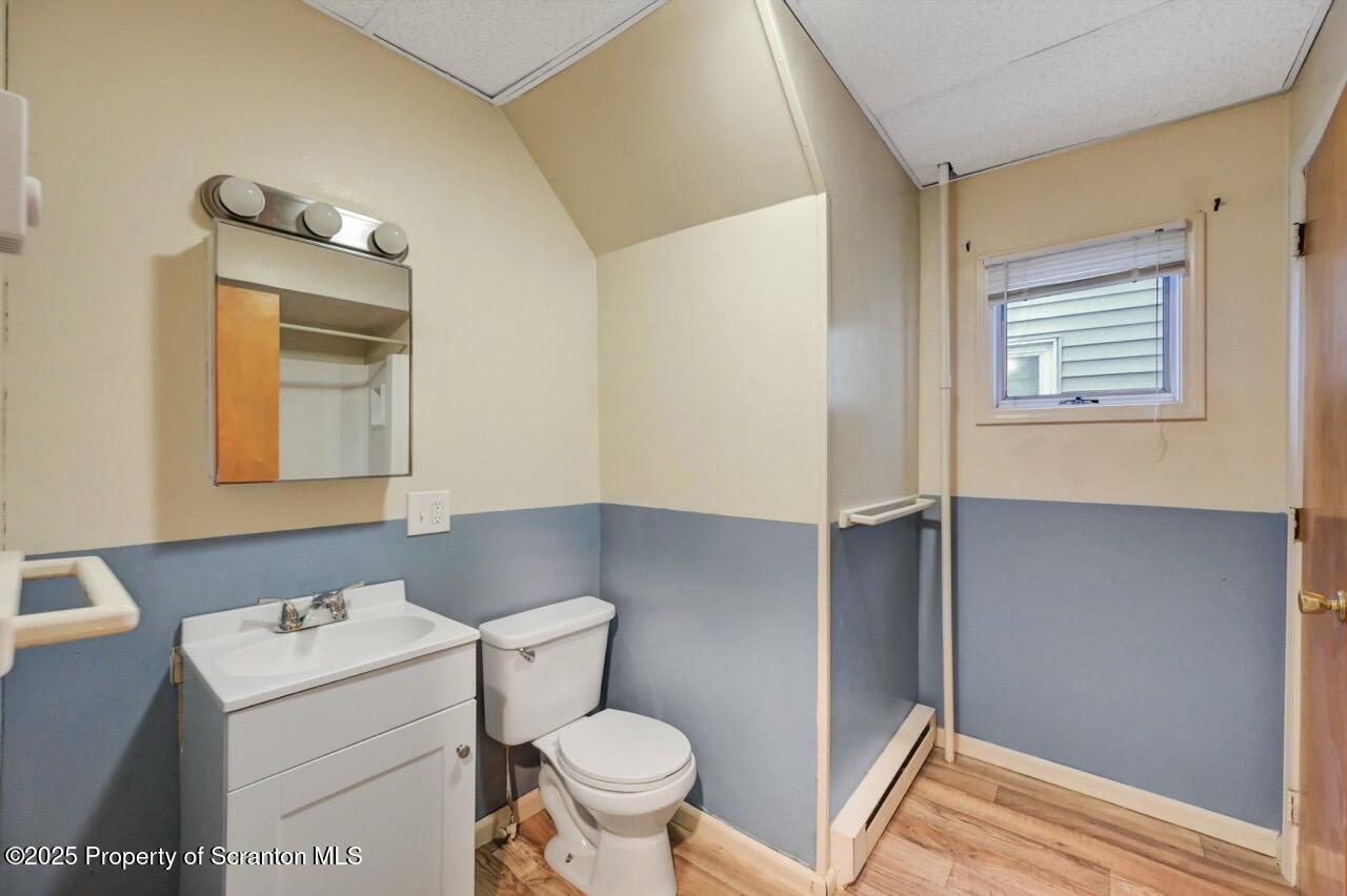601 Dean Street Scranton, PA 18509 - Photo 21 of 58 a bathroom with a sink and a toilet