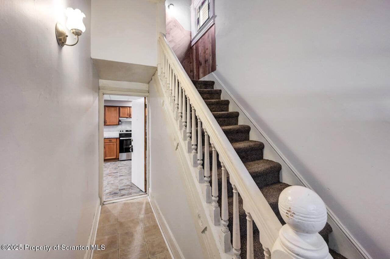 601 Dean Street Scranton, PA 18509 - Photo 3 of 58 a view of entryway and hall with wooden floor