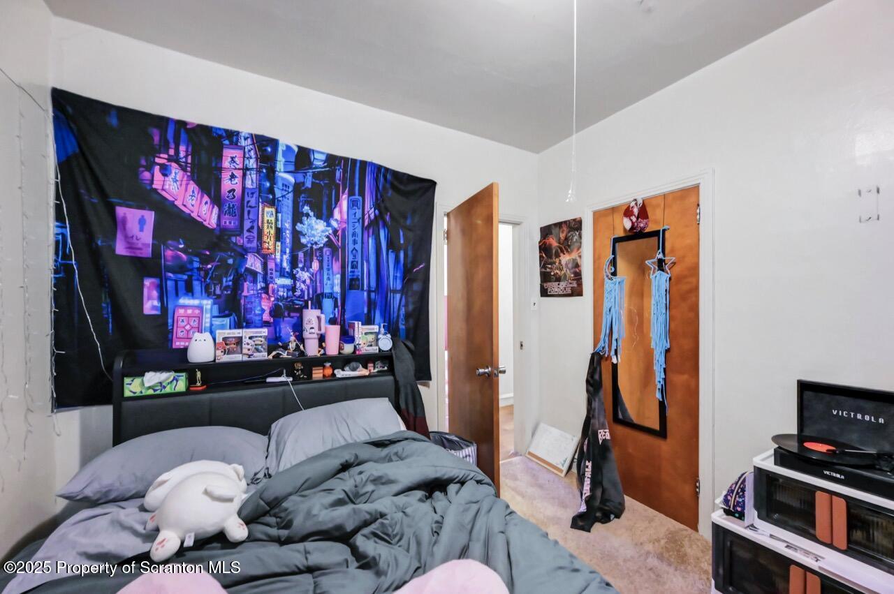 601 Dean Street Scranton, PA 18509 - Photo 43 of 58 a bedroom with furniture and a closet