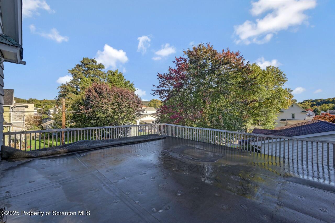 601 Dean Street Scranton, PA 18509 - Photo 49 of 58 a view of a pathway with a wrought fence