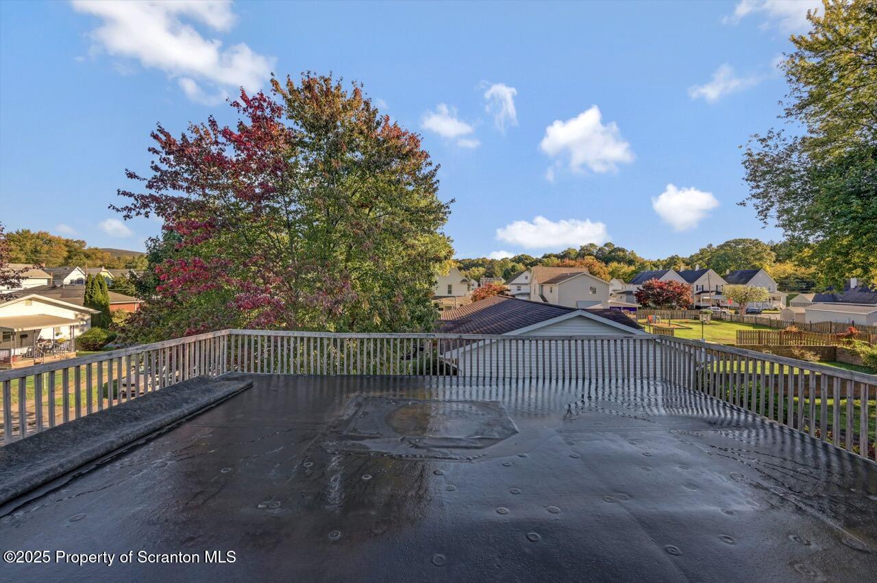 601 Dean Street Scranton, PA 18509 - Photo 50 of 58 a view of a pathway with a wrought fence