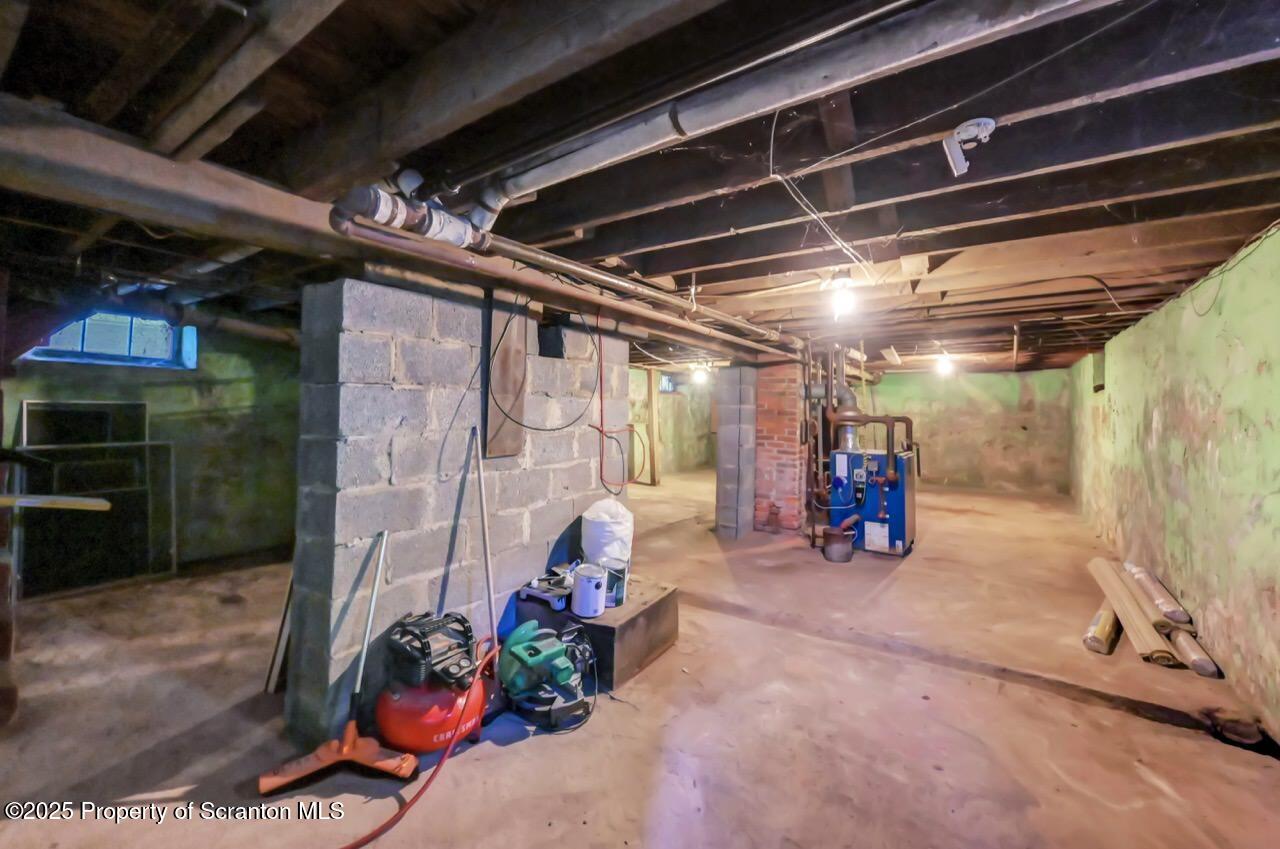 601 Dean Street Scranton, PA 18509 - Photo 51 of 58 a view of a garage with chairs