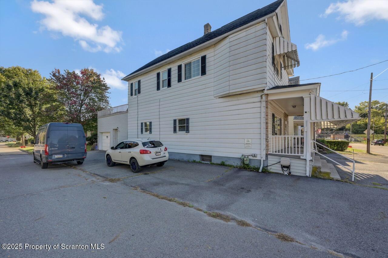 601 Dean Street Scranton, PA 18509 - Photo 57 of 58 a view of a car park in front of house