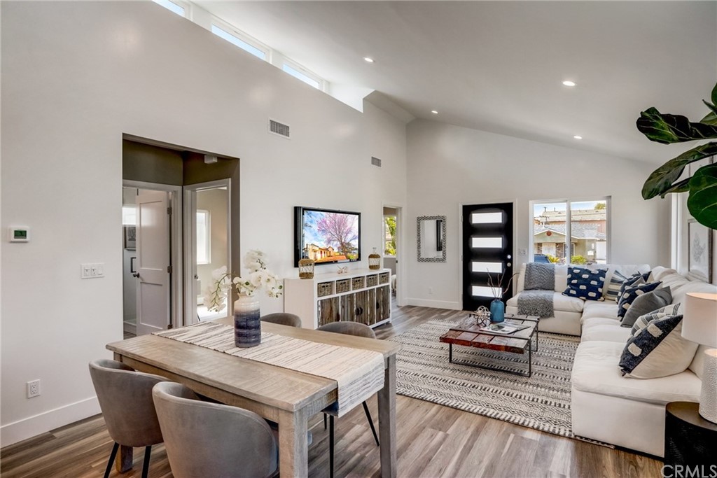 4566 166th Street Lawndale, CA 90260 - Photo 17 of 64 a living room with fireplace furniture and a flat screen tv