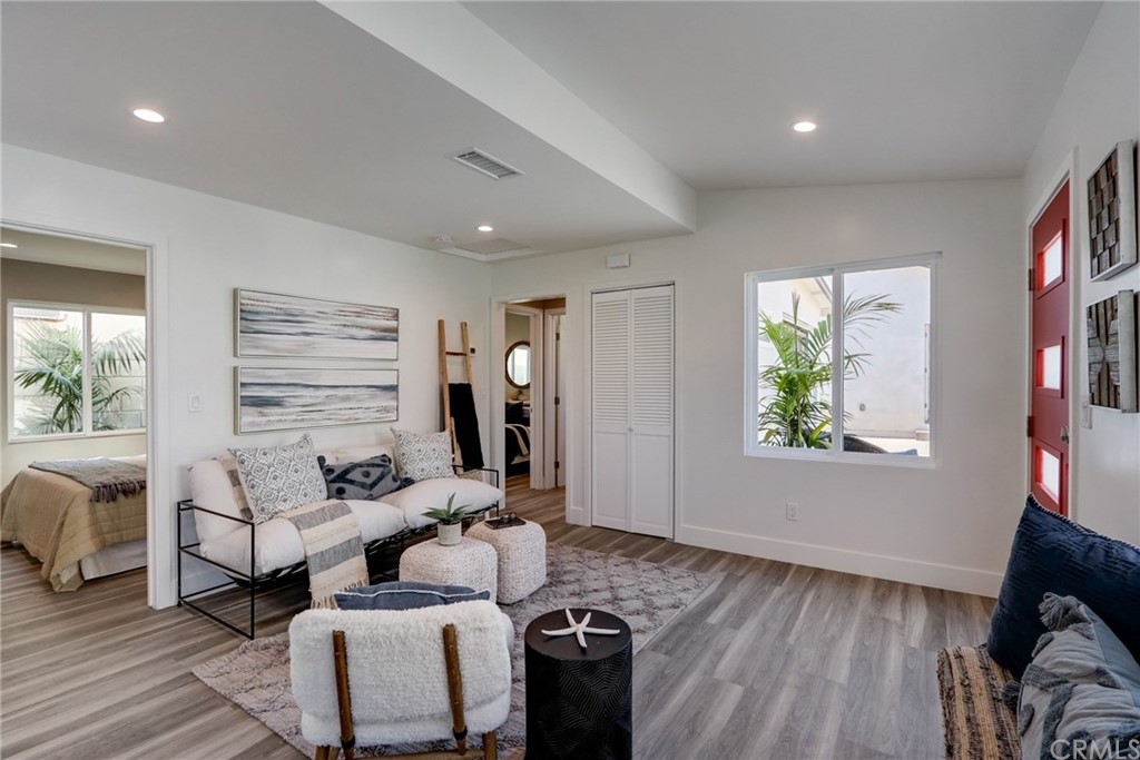 4566 166th Street Lawndale, CA 90260 - Photo 21 of 64 a living room with furniture and a wooden floor