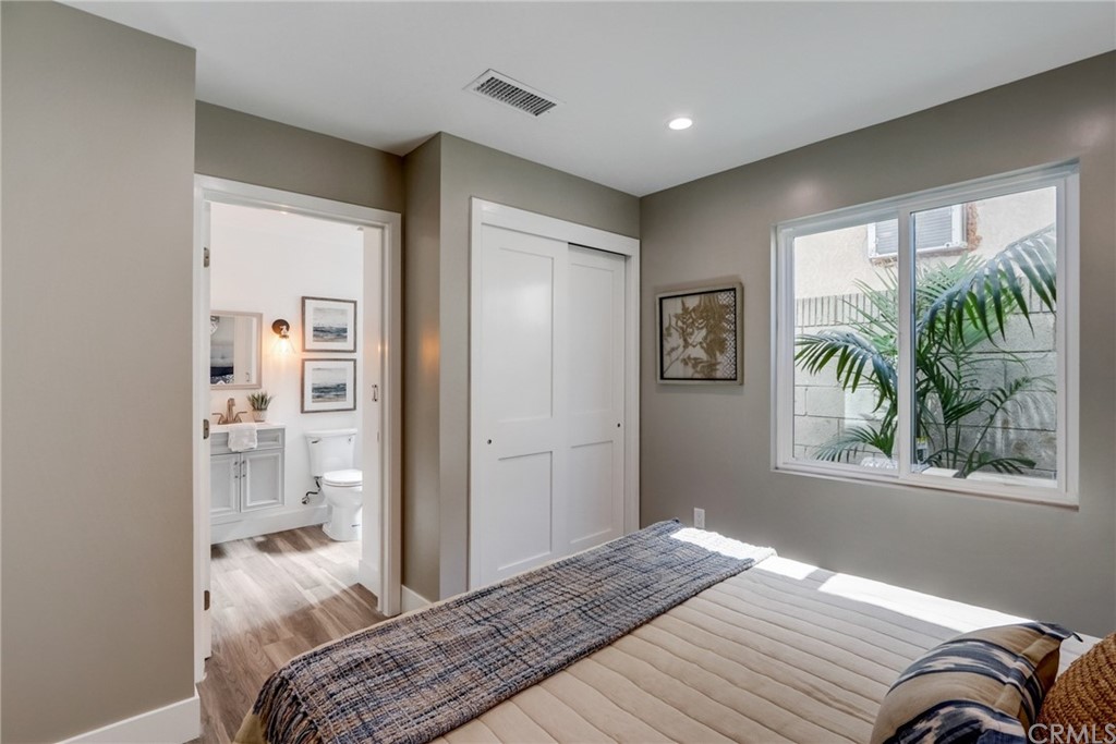 4566 166th Street Lawndale, CA 90260 - Photo 26 of 64 a bedroom with a large bed and a window