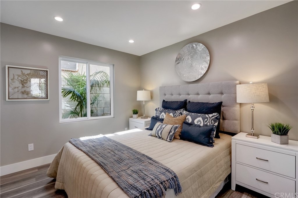 4566 166th Street Lawndale, CA 90260 - Photo 28 of 64 a bedroom with bed and a window