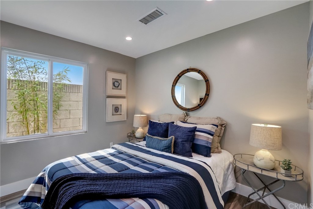 4566 166th Street Lawndale, CA 90260 - Photo 33 of 64 a bedroom with a bed and a window