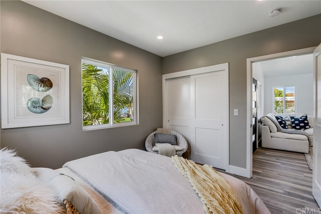 4566 166th Street Lawndale, CA 90260 - Photo 48 of 64 a bedroom with a bed and wooden floor