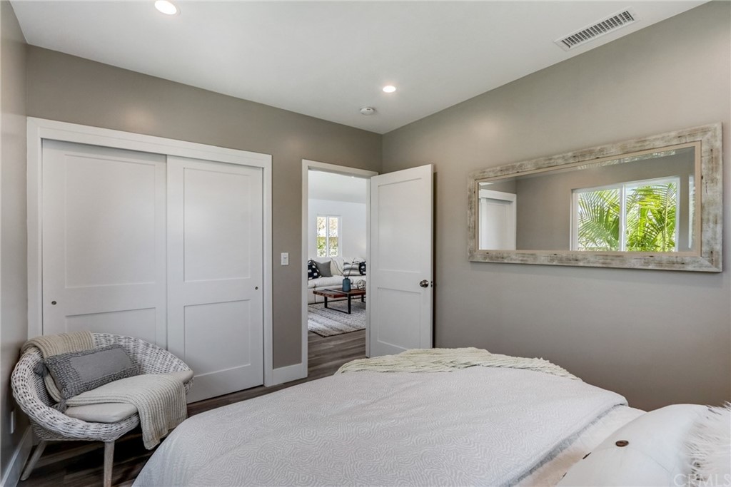 4566 166th Street Lawndale, CA 90260 - Photo 49 of 64 a bedroom with a bed and a couch