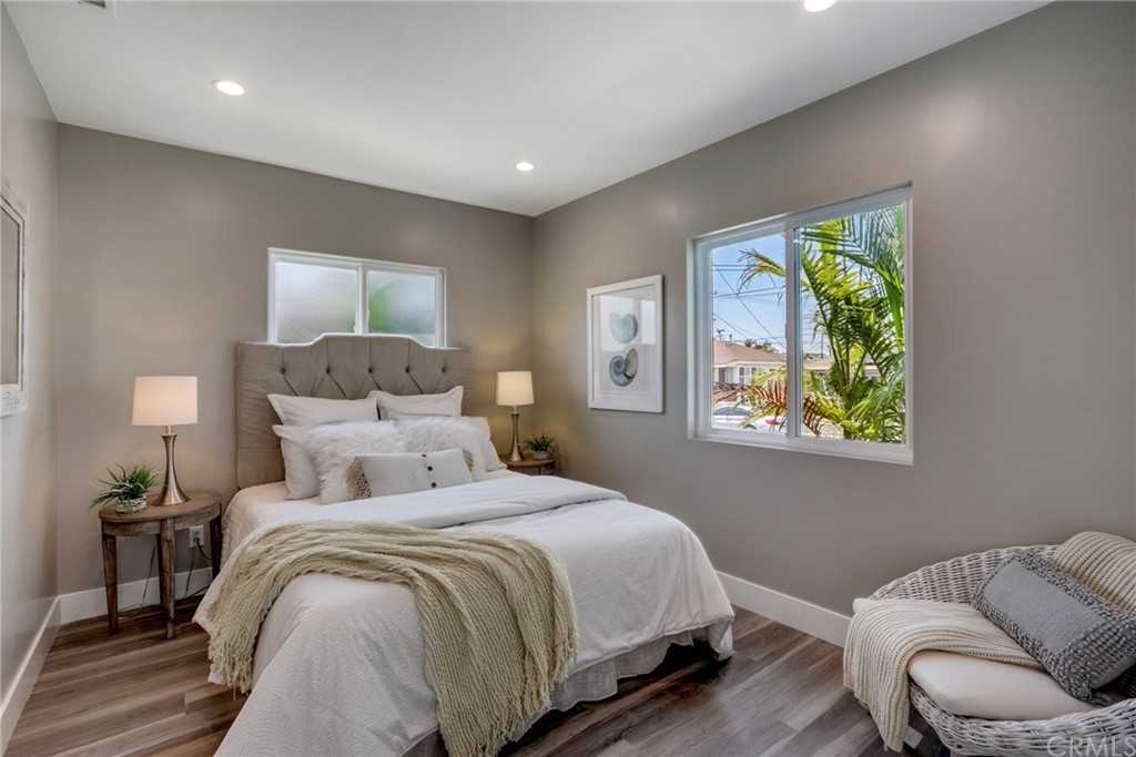 4566 166th Street Lawndale, CA 90260 - Photo 50 of 64 a bedroom with bed and a couch