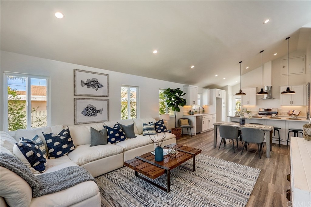 4566 166th Street Lawndale, CA 90260 - Photo 10 of 64 a living room with furniture kitchen view and a large window