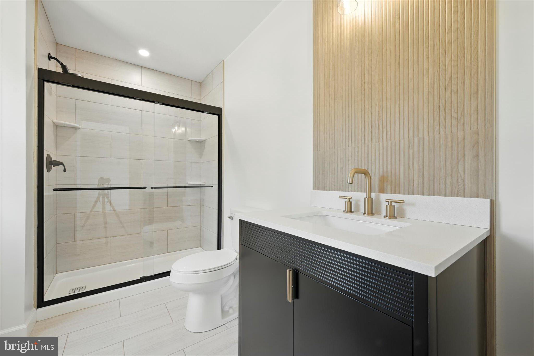 57 Ardmore Avenue Tamaqua, PA 18252 - Photo 19 of 34 a bathroom with a sink a toilet and shower