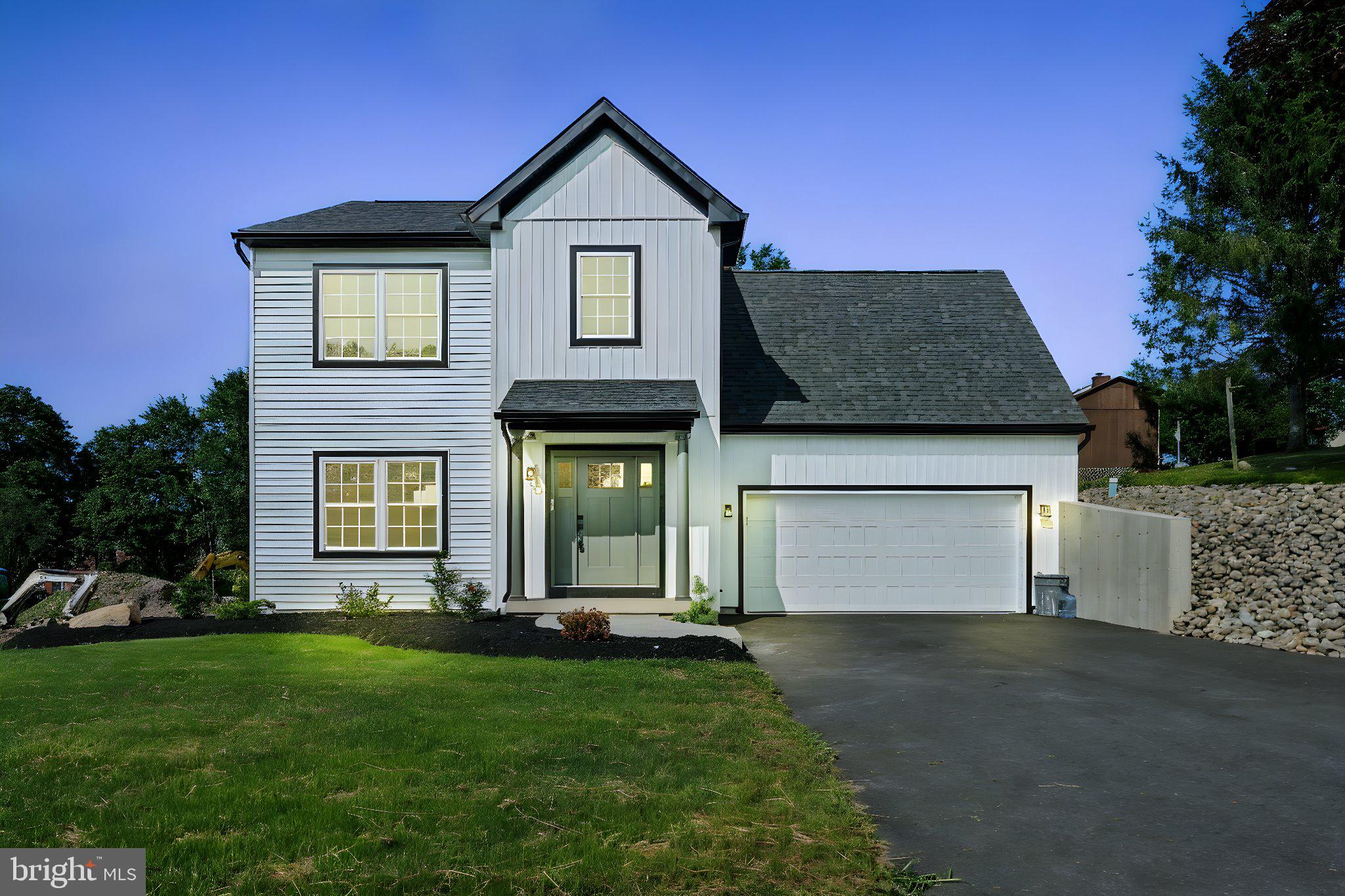 57 Ardmore Avenue Tamaqua, PA 18252 - Photo 2 of 34 a front view of a house with a yard and garage