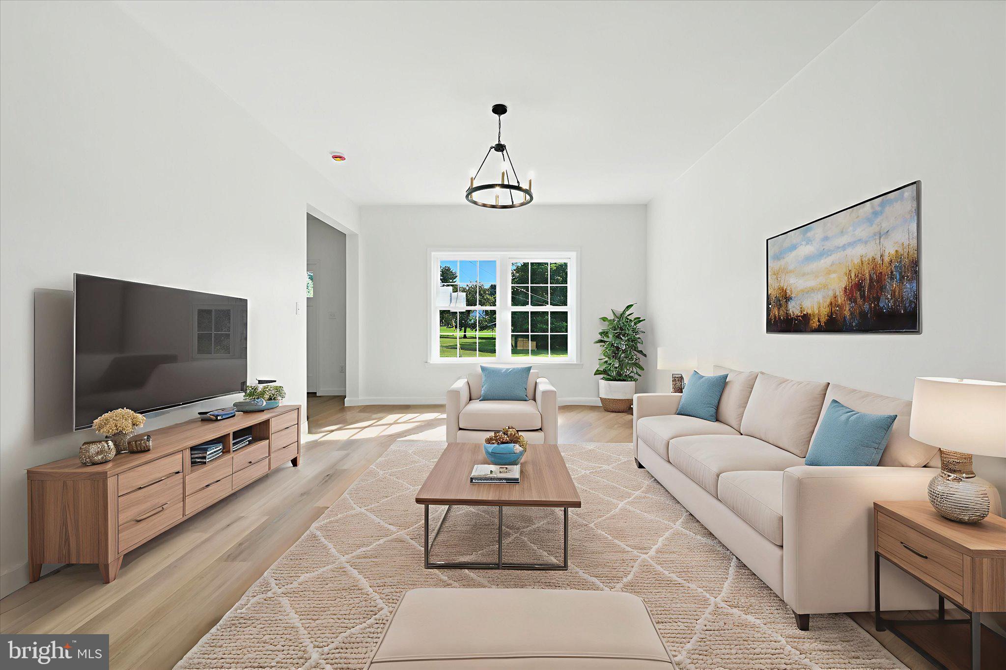 57 Ardmore Avenue Tamaqua, PA 18252 - Photo 8 of 34 a living room with furniture and a flat screen tv