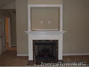 134 Wallflower Road Raeford, NC 28376 - Photo 9 of 9 a living room with a fireplace