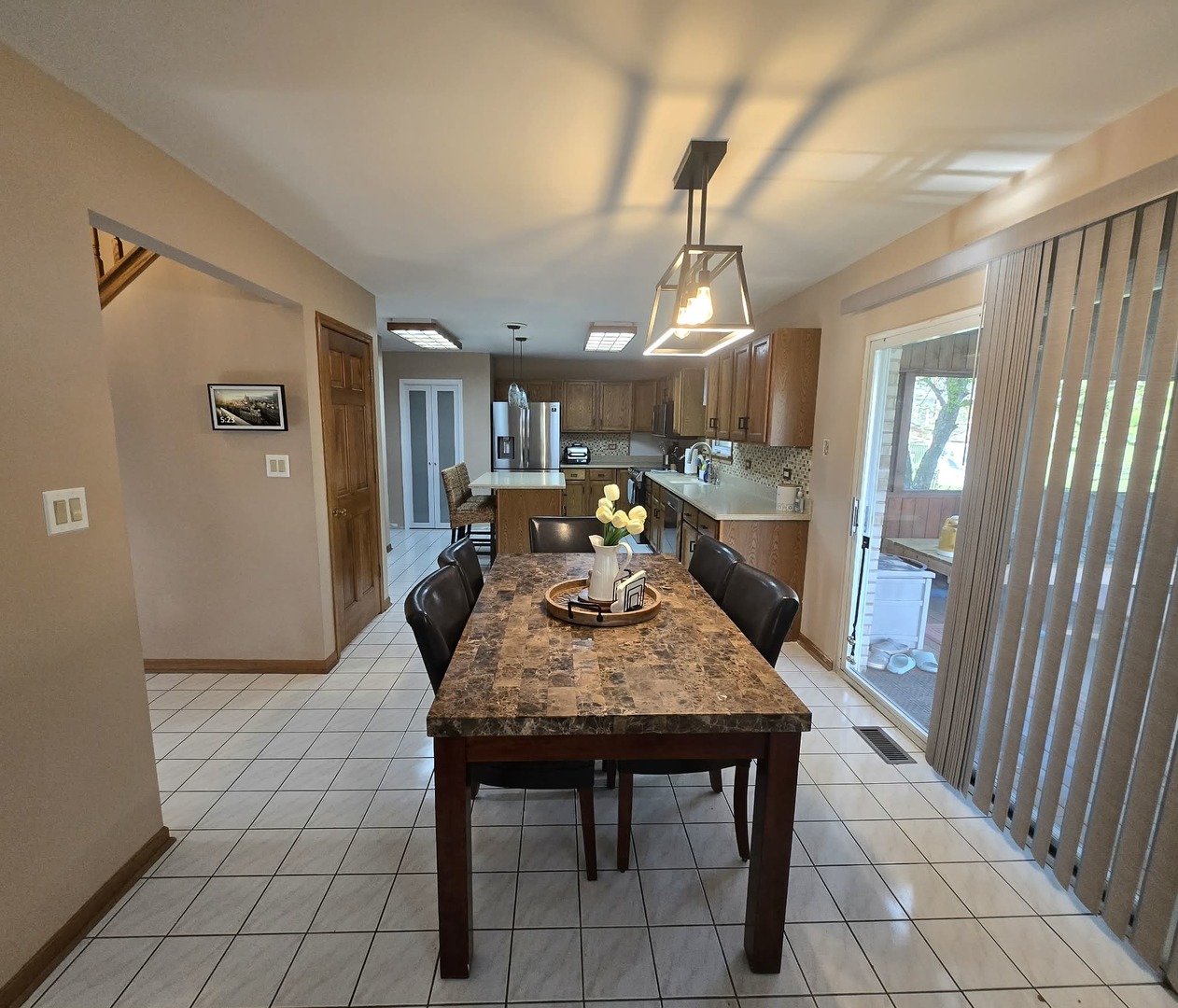 8141 Old Mill Road Frankfort, IL 60423 - Photo 13 of 39 a view of a dining room with furniture