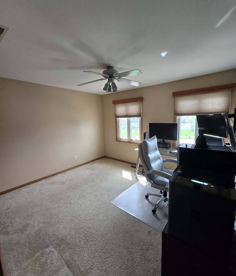 8141 Old Mill Road Frankfort, IL 60423 - Photo 30 of 39 a view of a workspace with furniture and a window