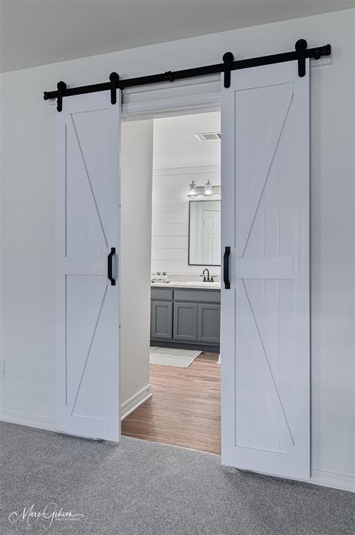 1140 Linton Road Benton, LA 71006 - Photo 15 of 39 a bathroom with a sink and mirror