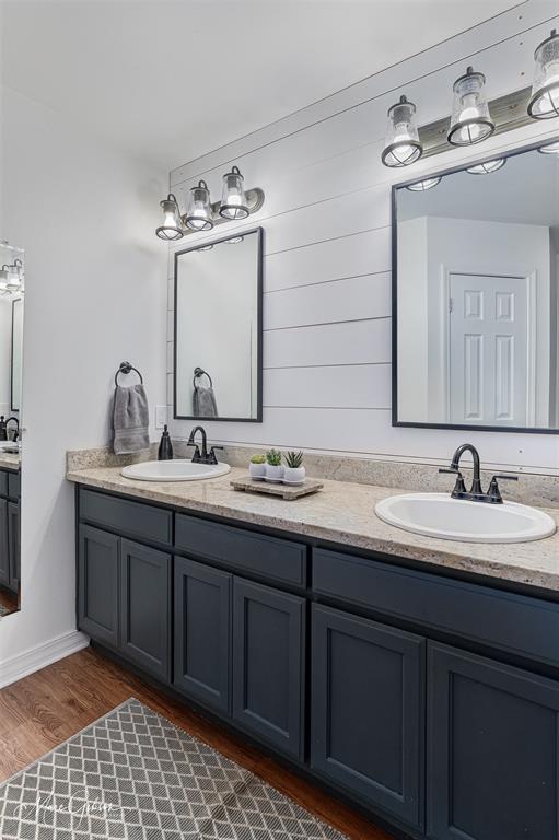 1140 Linton Road Benton, LA 71006 - Photo 16 of 39 a bathroom with a double vanity sink mirror and