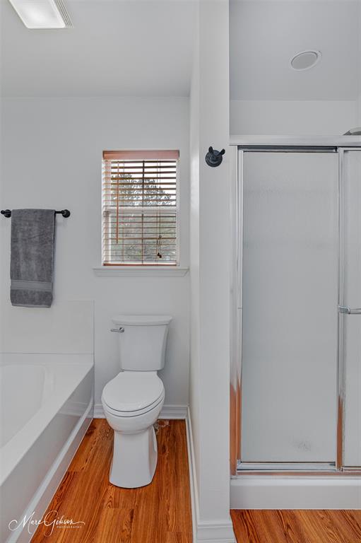 1140 Linton Road Benton, LA 71006 - Photo 17 of 39 a bathroom with a toilet and a sink