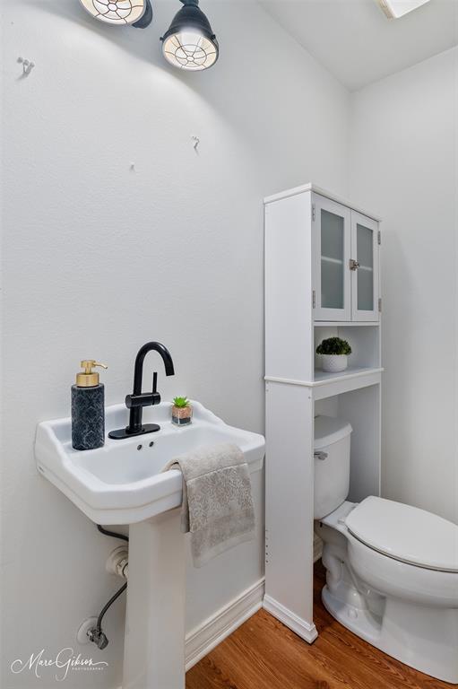 1140 Linton Road Benton, LA 71006 - Photo 19 of 39 a bathroom with a sink a toilet and vanity