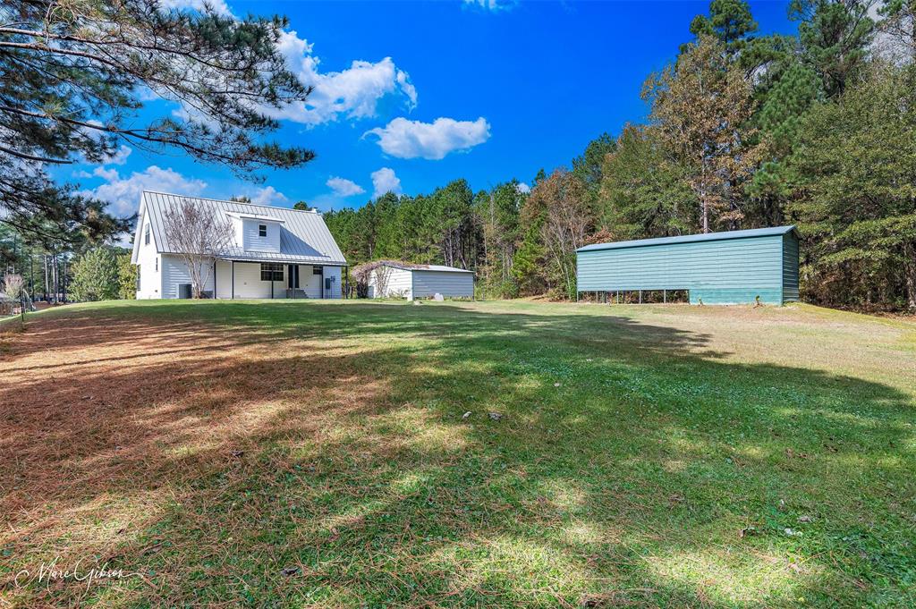 1140 Linton Road Benton, LA 71006 - Photo 29 of 39 a front view of a house with a yard