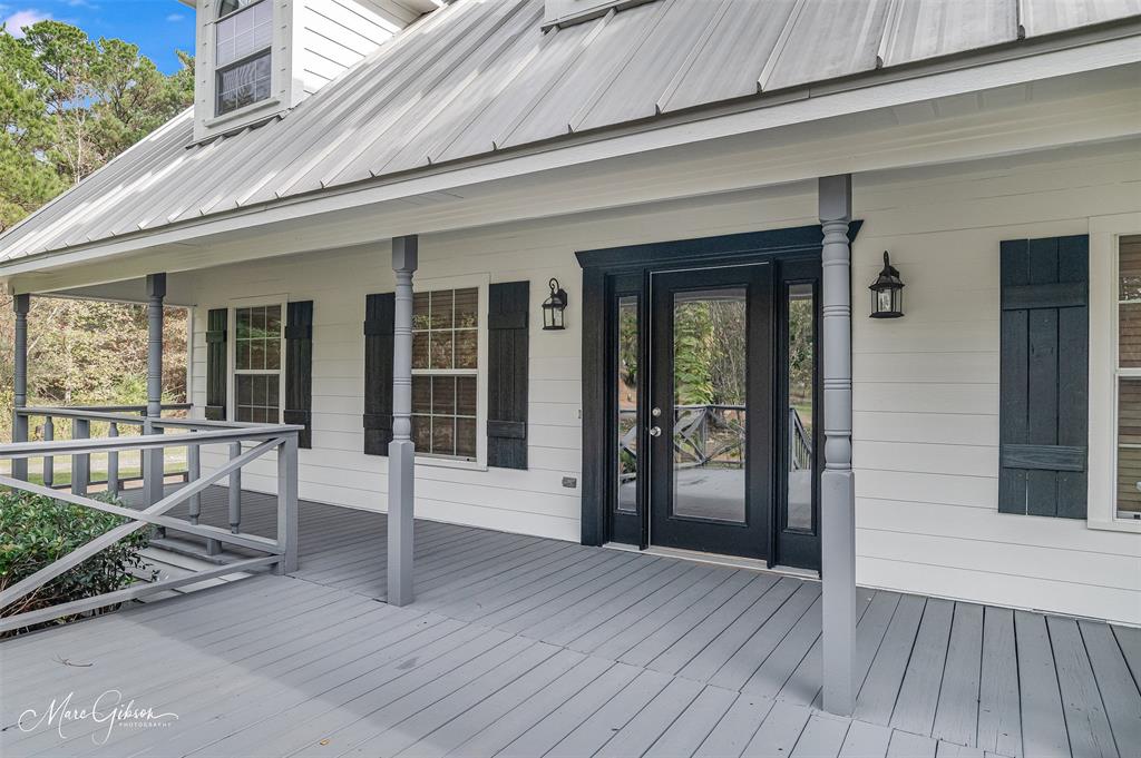 1140 Linton Road Benton, LA 71006 - Photo 4 of 39 a view of a house with porch