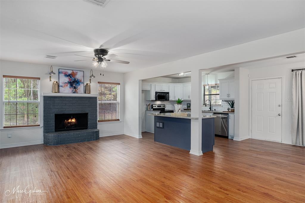 1140 Linton Road Benton, LA 71006 - Photo 5 of 39 a open kitchen with window and a fireplace