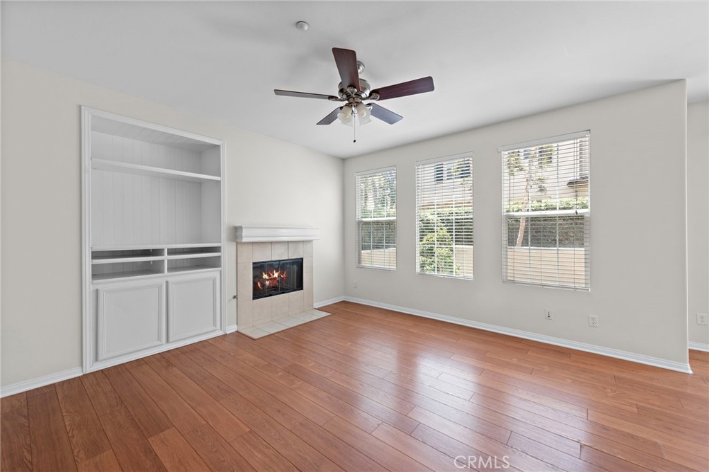 31 Notchbrook Lane Ladera Ranch, CA 92694 - Photo 5 of 24 a view of an empty room with a window and wooden floor
