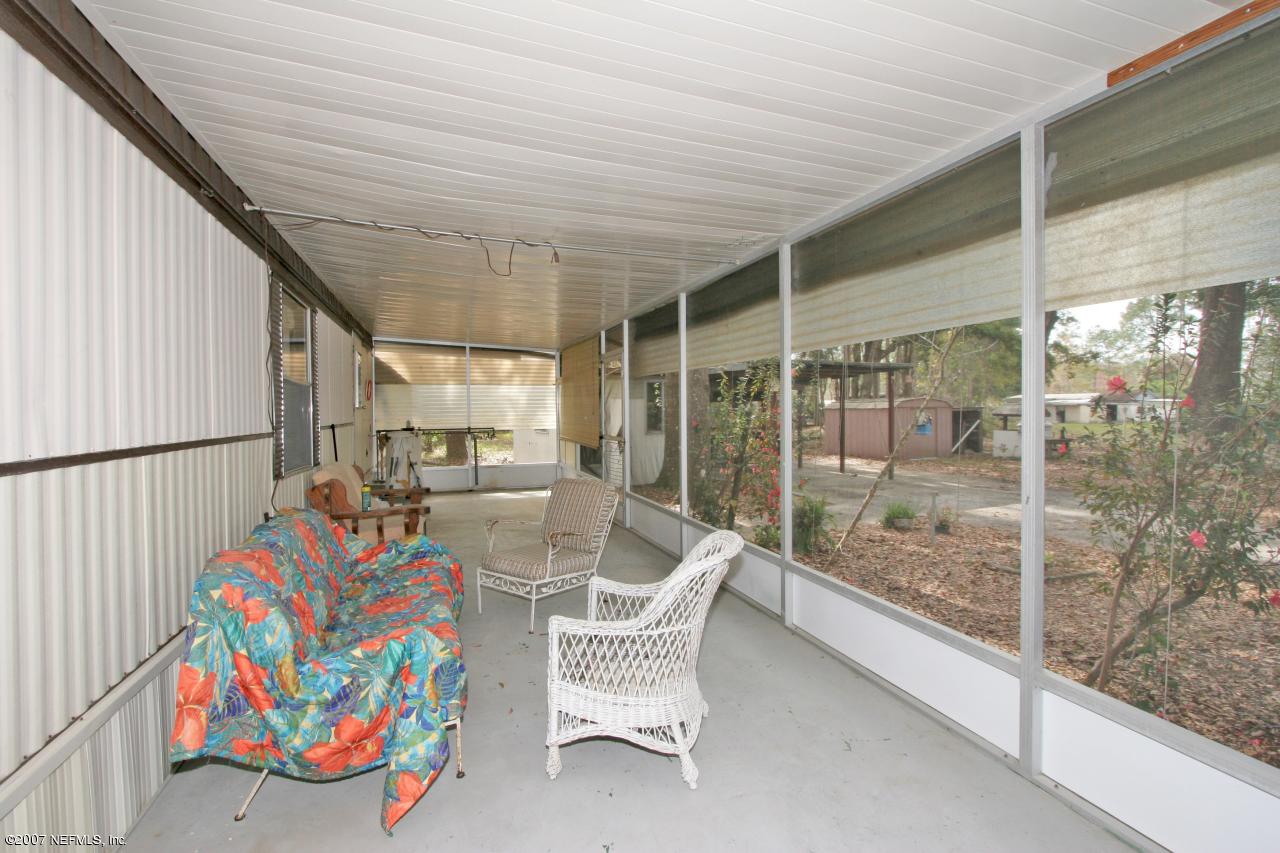 101 Paradise Point Road Satsuma, FL 32189 - Photo 2 of 8 back porch