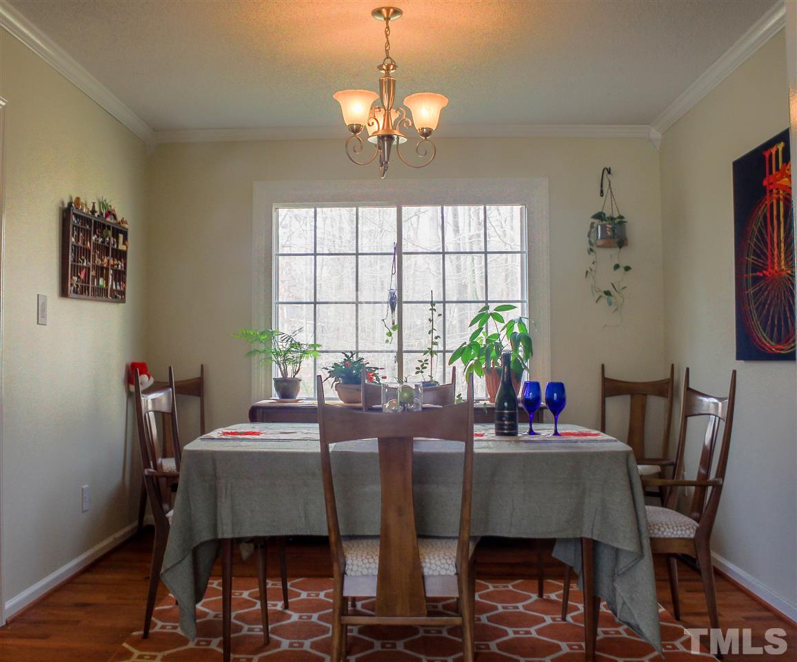 6401 Rushingbrook Drive Raleigh, NC 27612 - Photo 3 of 19 a dining room with furniture and window