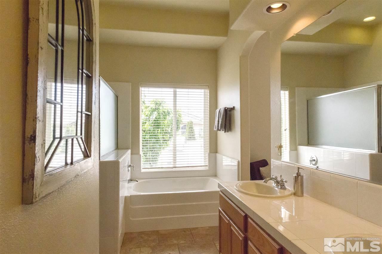 1104 University Ridge Drive Reno, NV 89512 - Photo 17 of 25 a view of bathroom with dual sinks