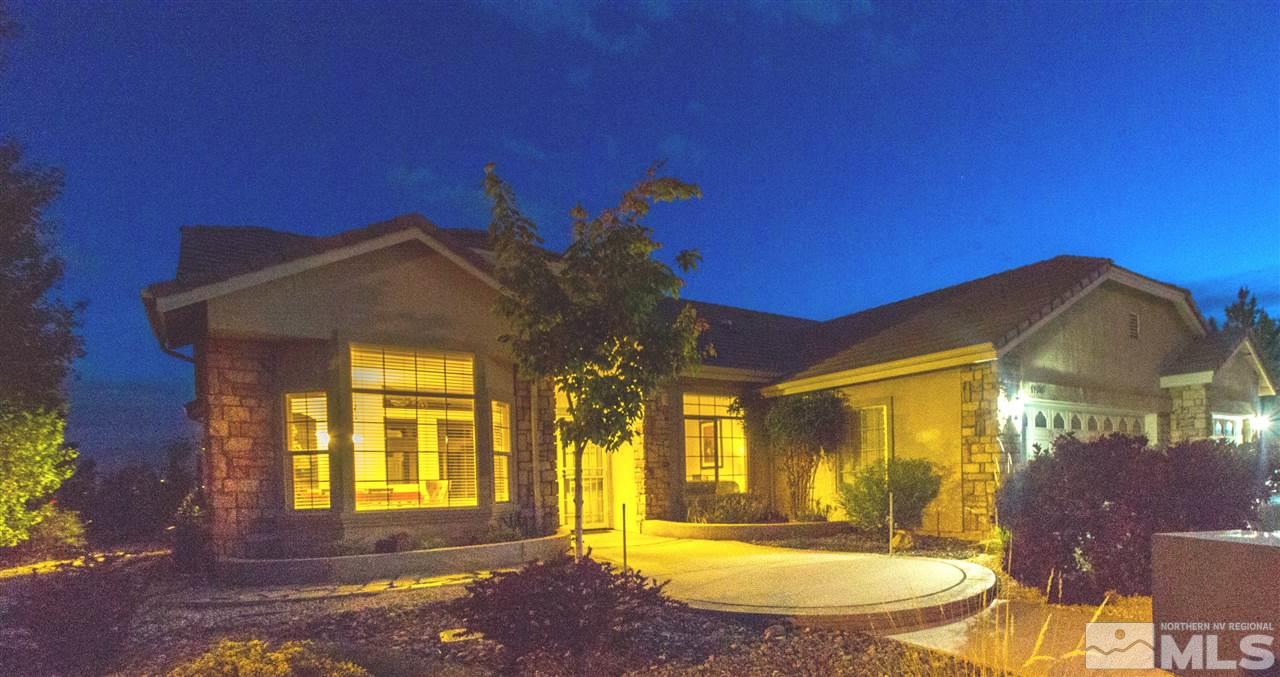 1104 University Ridge Drive Reno, NV 89512 - Photo 4 of 25 a view of a house with a swimming pool
