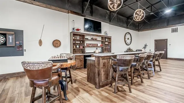 a view of a table and chairs in a kitchen
