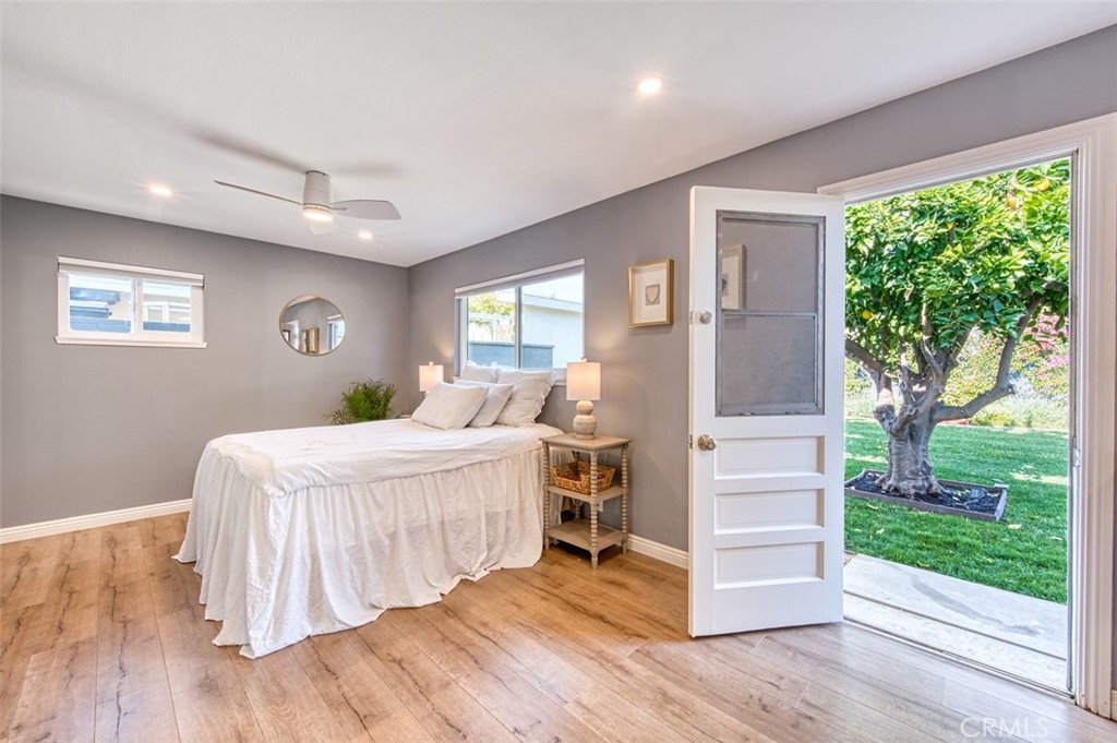1127 Maynard Drive Duarte, CA 91010 - Photo 11 of 20 a bedroom with a bed and large windows