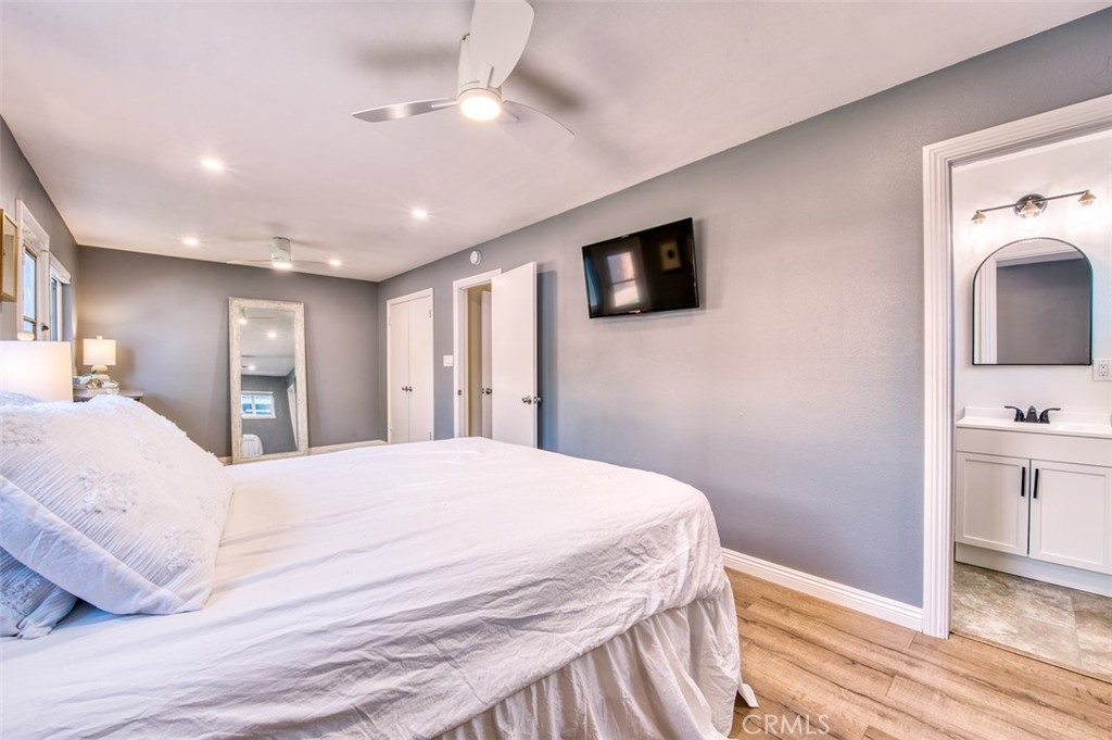 1127 Maynard Drive Duarte, CA 91010 - Photo 12 of 20 a bedroom with a bed and a flat screen tv