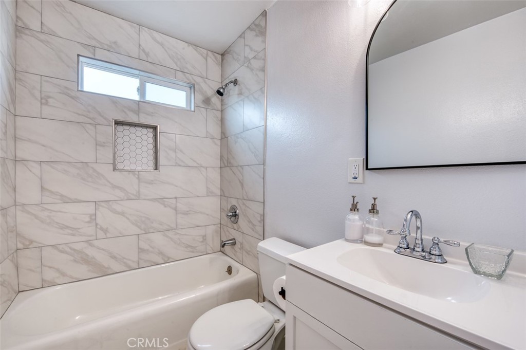 1127 Maynard Drive Duarte, CA 91010 - Photo 16 of 20 a bathroom with a sink toilet vanity and bathtub