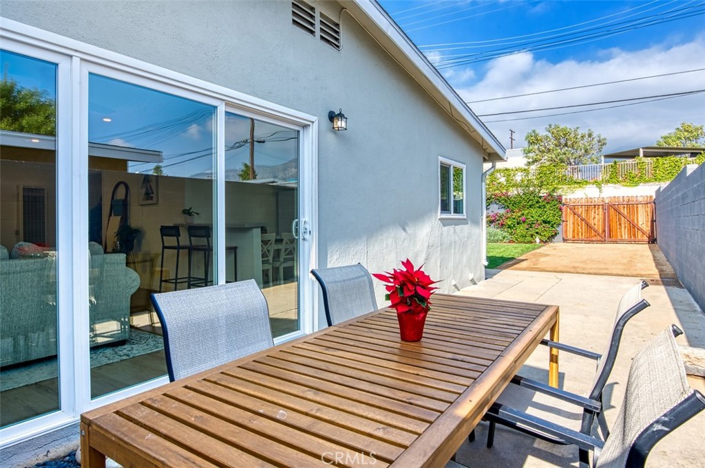 1127 Maynard Drive Duarte, CA 91010 - Photo 9 of 20 a view of a patio with table and chairs and potted plants