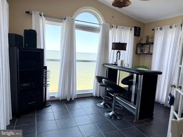 a room with furniture and window