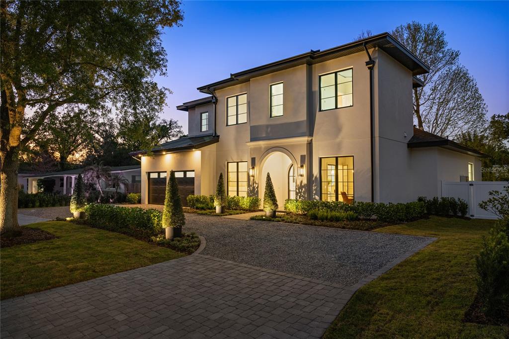1833 Loch Berry Road Winter Park, FL 32789 - Photo 1 of 1 a front view of a house with a yard