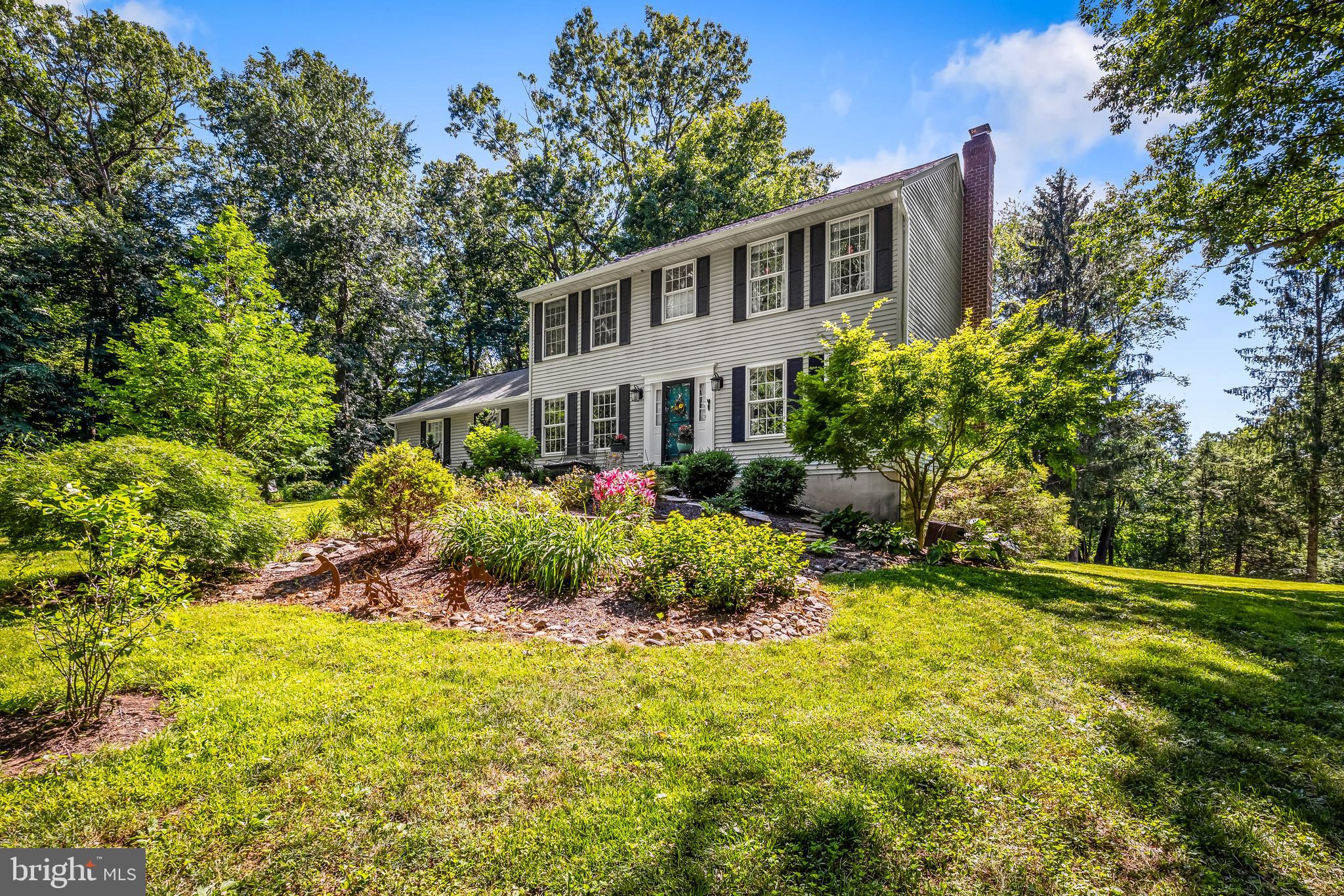 5026 Mt Carmel Road Hampstead, MD 21074 - Photo 3 of 57 a house view with a garden space