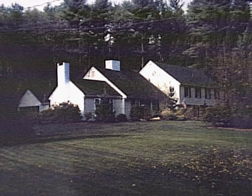 90 Sears Road Wayland, MA 01778 - Photo 1 of 1 a view of a house with a yard