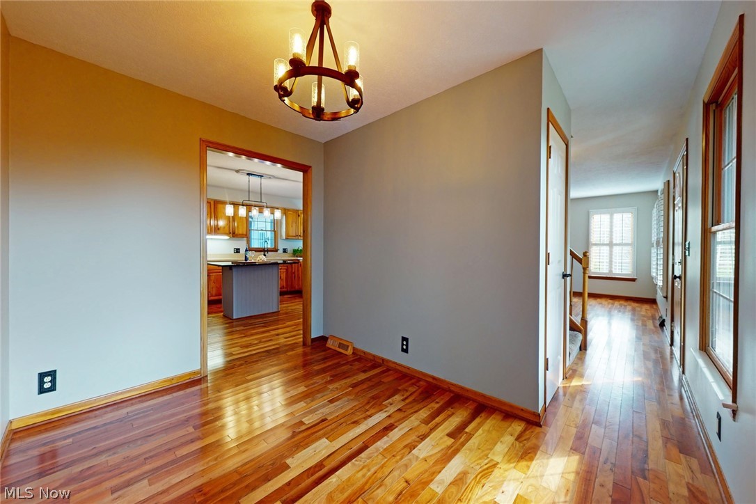 2531 Blake Road Wadsworth, OH 44281 - Photo 6 of 34 This is the dining room, looking into the kitchen on the left and the living room on the right. Notice the beautiful, Brazilian hardwood throughout the first floor...